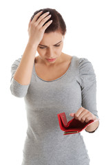 Beautiful casual woman with empty wallet, worrying.