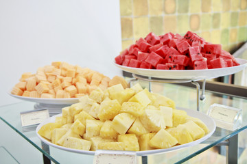 A plate of famous tropical fruits : Pineapple, papaya and Waterm