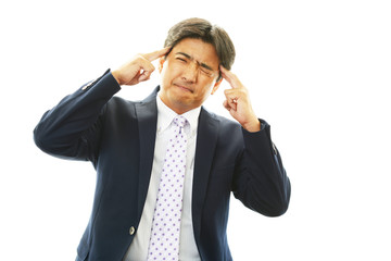 困惑するビジネスマン