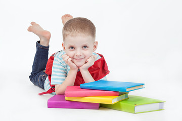 Boy and books isolated on a white background