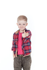 Portrait of happy boy with hands in pockets isolated on white ba