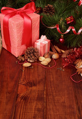 Fototapeta na wymiar Nuts, chocolate and two Christmas gift