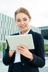 Businesswoman using tablet computer