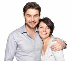Fototapeta premium Closeup portrait of beautiful happy couple - isolated