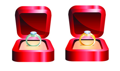 gold rings and silver rings with diamond in a red box wedding