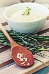 Healthy eating background with bowls of rice and spices