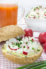 Bread roll with cottage cheese,radish and chives