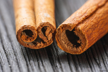 cinnamon on the wooden background