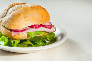 sandwich with bacon and vegetables