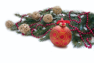 Christmas Decoration: Christmas red ball, twig of fir and beads
