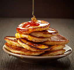 pancakes with maple syrup on plate