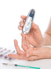 Diabetes patient measuring glucose level blood test