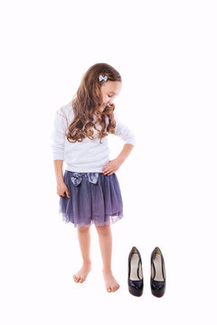 Toddler girl want wearing big shoes