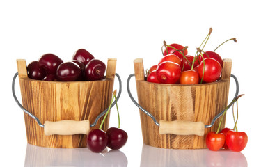 Sweet cherries in wooden buckets