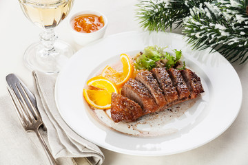 Roasted Duck Breast on New Year's festive table