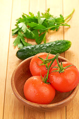 tomatoes in wooden bowlin