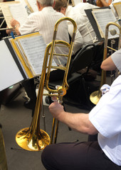 musician plays the trumpet in the orchestra © schankz