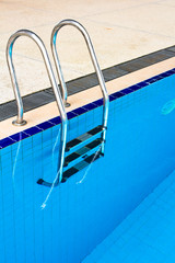 Stairs of the empty swimming pool in university