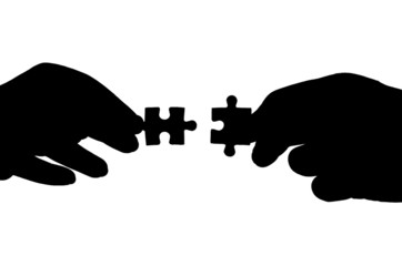 hand and puzzle isolated on white background