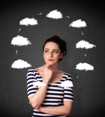 Young woman thinking with cloud circulation around her head