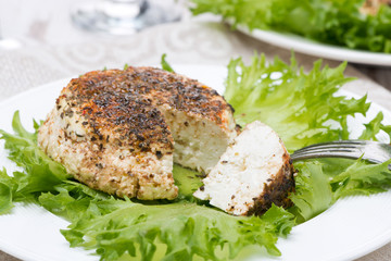 spicy baked homemade cheese and fresh salad