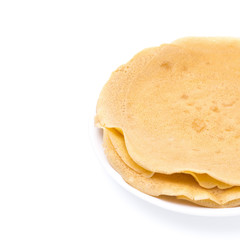 stack of crepes on a plate, isolated