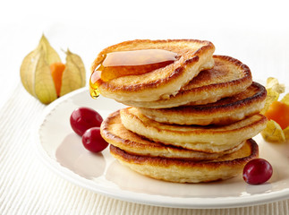 stack of pancakes on white plate