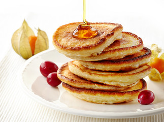 stack of pancakes on white plate