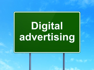 Marketing concept: Digital Advertising on road sign background