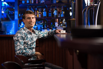 man with a cup of coffee