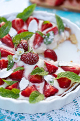Strawberry tart with mascarpone cheese and mint