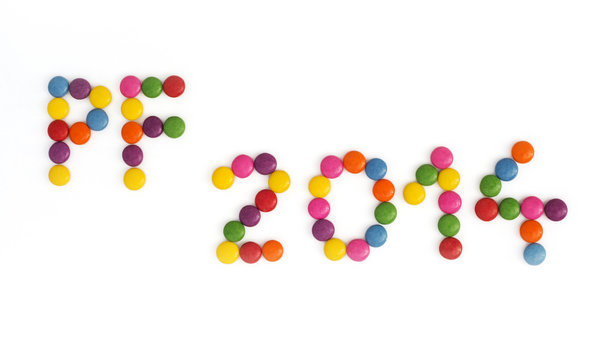 The title PF 2014 written of the colored smarties
