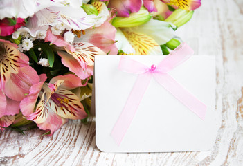 alstroemeria flowers with a white card