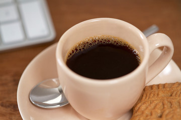 Obraz na płótnie Canvas Cup of Coffee on a desk or table