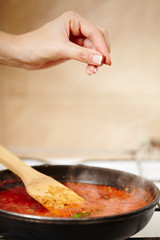 Boiling tomatoes sauce in the pan