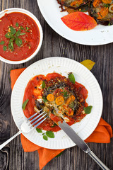 Grilled eggplants with mozzarella, parmesan and tomato