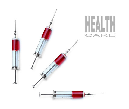 Glass syringes isolated on a white background.