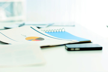 Closeup image of a table full of documents