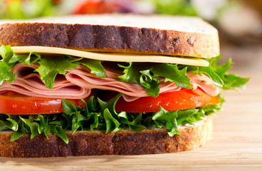 sandwich with bacon and vegetables