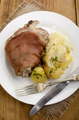 cooked  pork knuckle on a plate