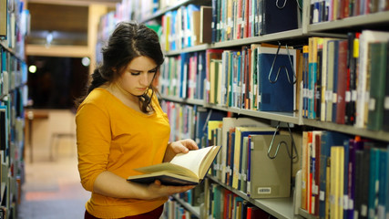 Girl studying in library