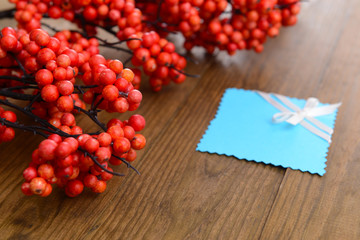 Artificial berries, on wooden background