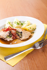 Pork with horseradish, sliced ​​ham and mushrooms
