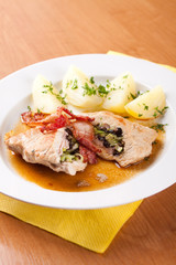 Pork with horseradish, sliced ​​ham and mushrooms