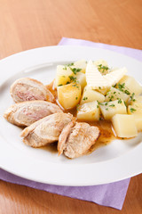 Pork rolls with sauerkraut and boiled potatoes