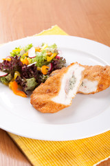 Chicken fillet with blue cheese and vegetables