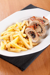 Pork fillet in foil with french fries