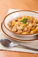 Mixed meat with potatoes and sauce