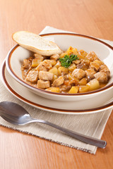 Mixed meat with potatoes and sauce