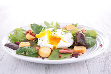 salad with egg, crouton and bacon